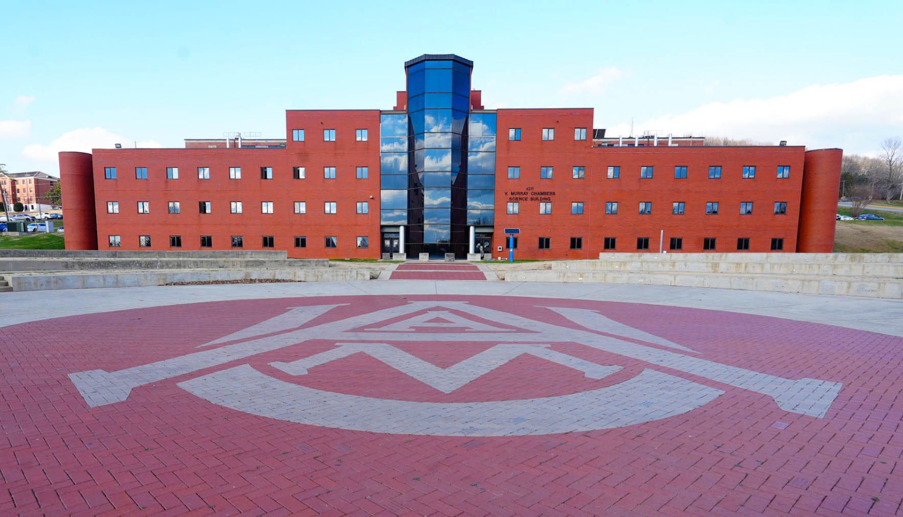 Photo of Alabama A&M University Interlock logo on the Quad and Science Building